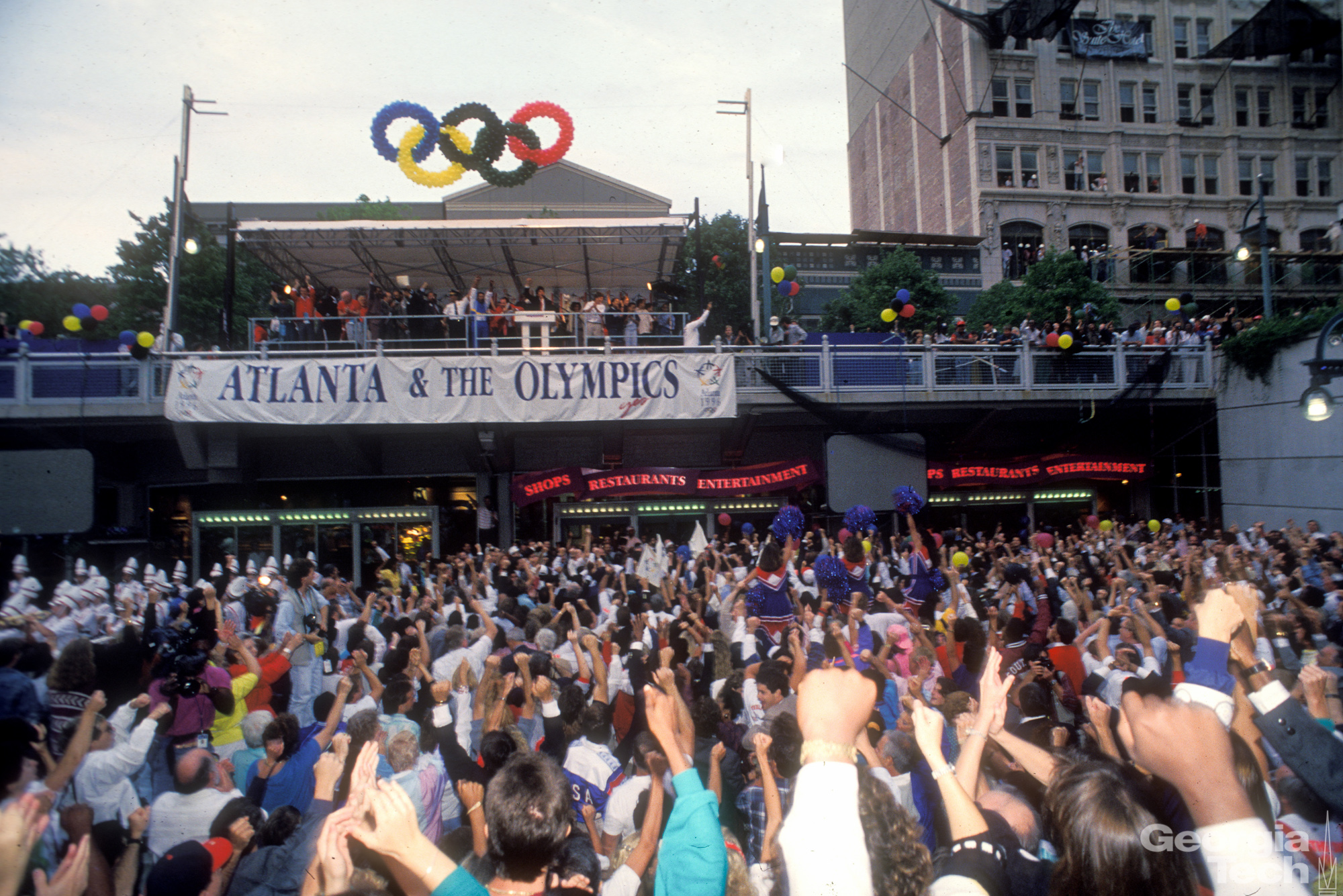 Crowd of people celebrating Atlanta's bid for the Olympics