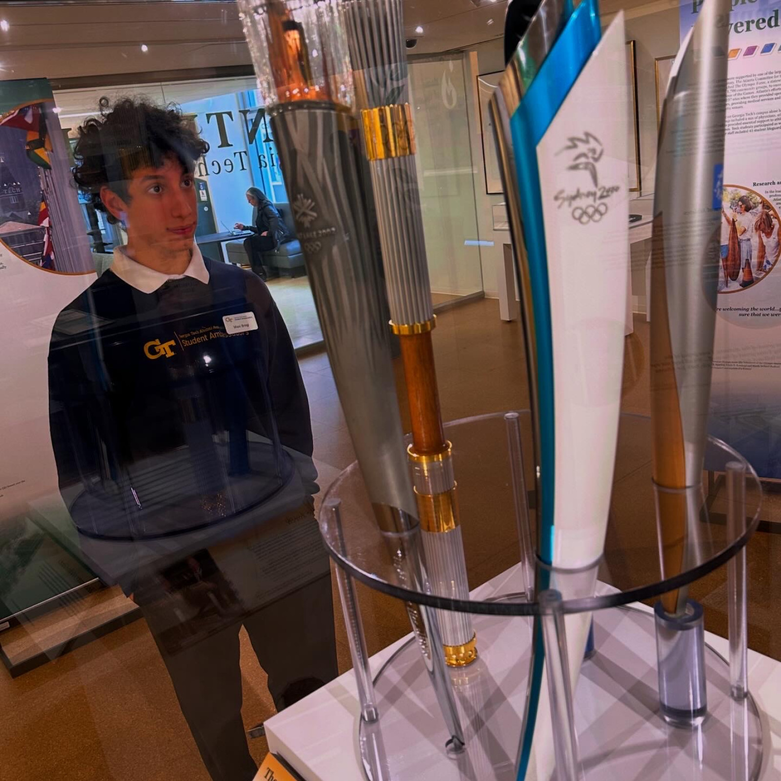 Student Looking At Artifact At "Centennial Summer: GT's Olympic Legacy" Exhibit